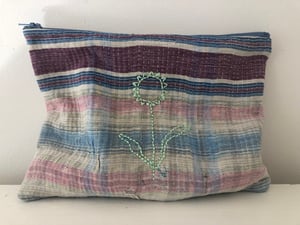 Image of mint flower on blue vintage kantha