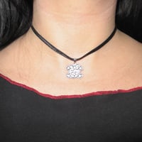 Image 2 of cutie bow skull choker