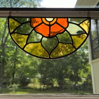 Image 2 of amber window topper