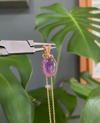 Image 1 of Gold Amethyst Oval Crystal Necklace