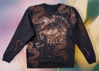Image 1 of “NOTHING IS REAL” CUSTOM BLEACH PAINTED SWEATER LARGE