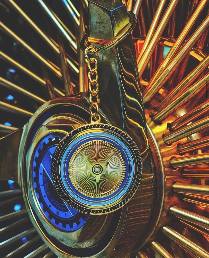 Image of Gold thangs/wire wheel keychain