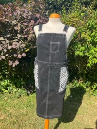 Image 1 of Upcycled Dungaree Dress with White Stencil Sayagata Pocket Design.