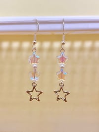 Image 3 of shooting star holographic earrings