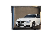 Image 1 of Esha - BMW with initial E inside