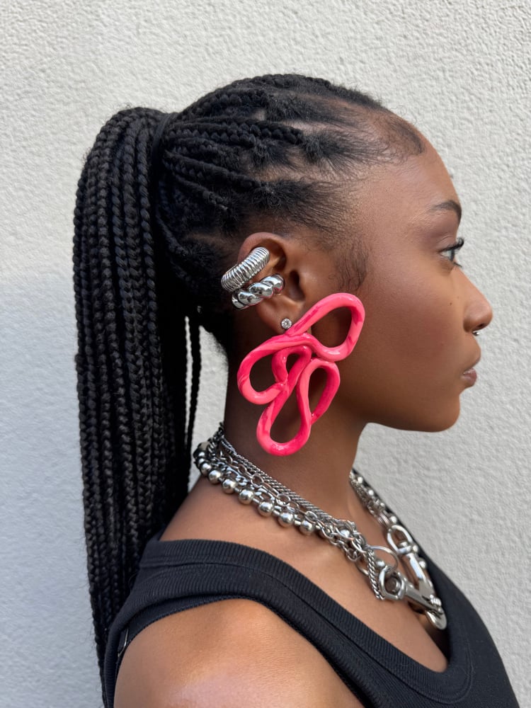 Image of pink cursive piece 