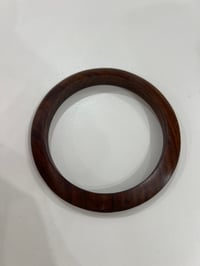 Image 2 of wooden bangle with studs