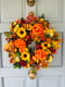 Image of 30cm Rattan - orange roses and sunflowers