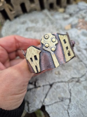 Copper bracelet with trees, houses, cat and star