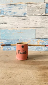 Image 4 of Spotty paint brush storage.
