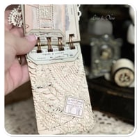 Image 14 of Petite snippet sample french lace book in a tiny french biscuit tin.