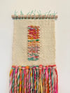 Candy yarn and a rectangle. Woven wall. hanging. 
