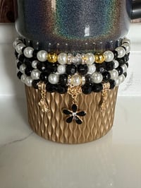 Image 1 of Wild Blooms Black, Gold, and Cream Tumbler Bracelet Stack