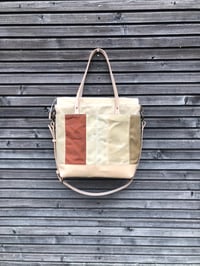 Image 6 of  Large tote bag in waxed canvas and leather with cross body strap 