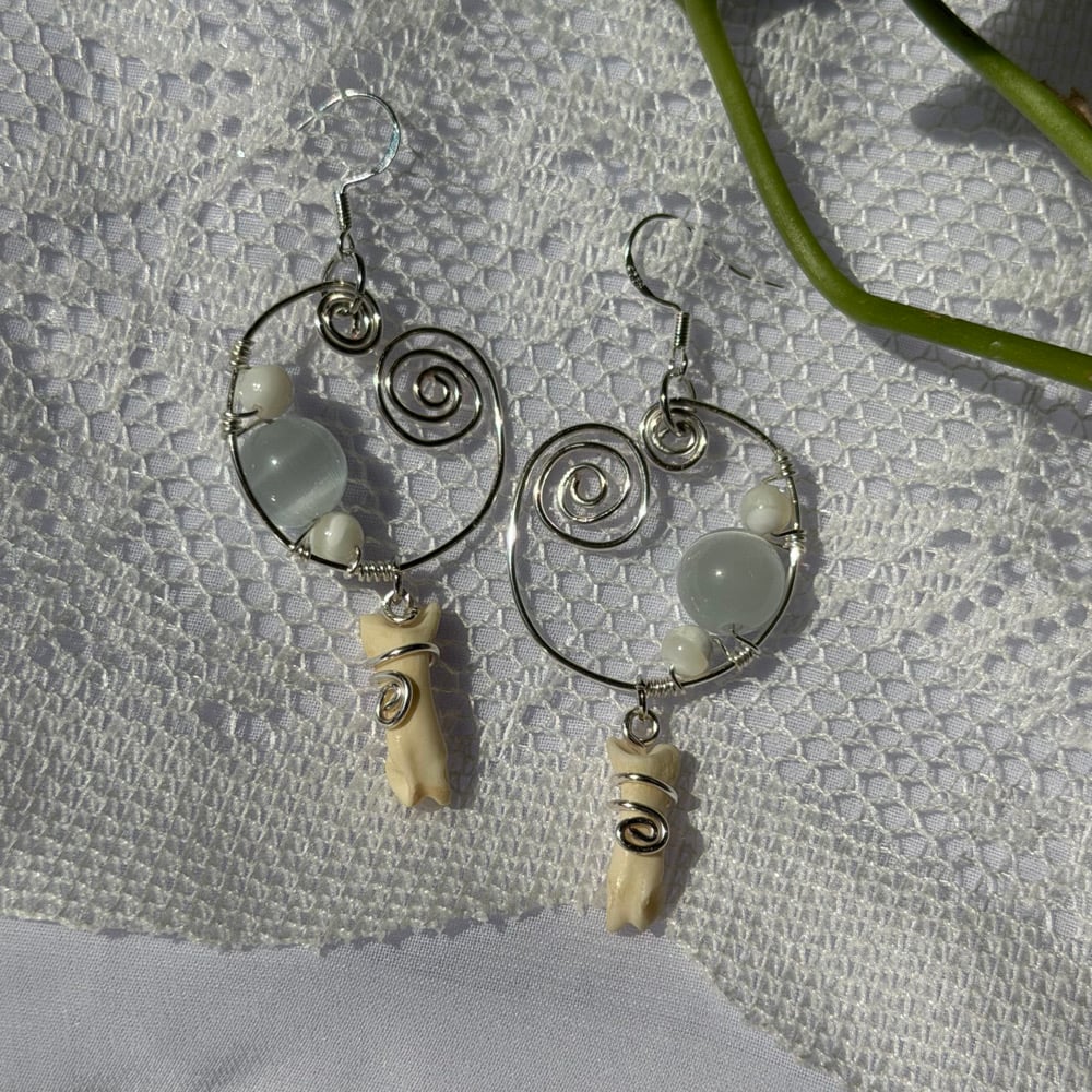 Image of cloud bone earrings