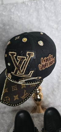 Image 4 of Black & Classic Brown Crocs with Hat