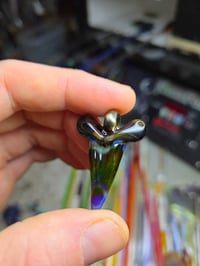 Image 3 of Electrum/amber purple glass shark tooth pendant. 
