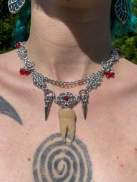 Image 1 of “bite your lip” tooth fairy necklace 
