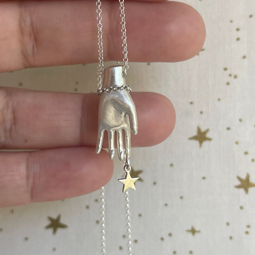 Image of star hand necklace 