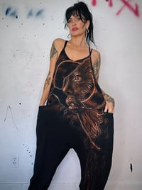 Image 2 of “BE EXPANSIVE” BLEACH PAINTED BAGGY ROMPER MEDIUM