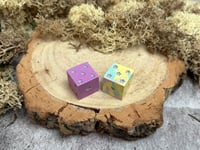 Image 2 of D6 Dice Pair Purple and Yellow with Star Pips