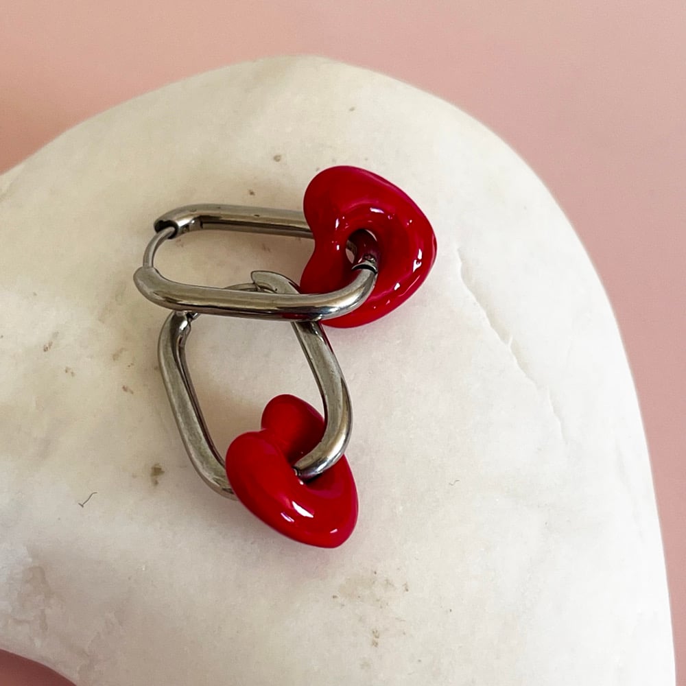 Image of Oval Huggies with Red Glass Heart