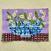 Image 1 of Chamomile in a Blue and White Bowl