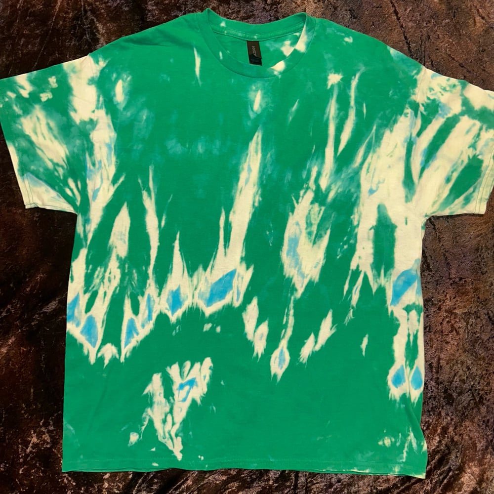 Image of green bleach dye tshirt with fairy wing design