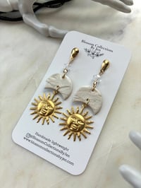 Image 2 of Moon and sun