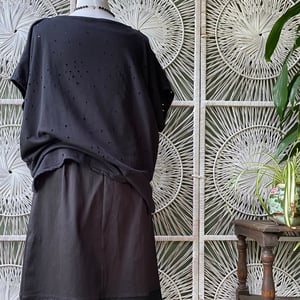 Image of Black holey overtop 