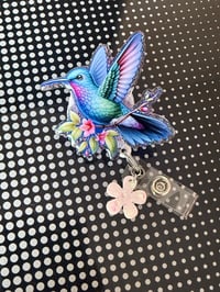 Image 1 of hummingbird badge reel 