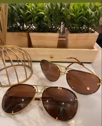 Image 3 of Brown on gold Porshe designs