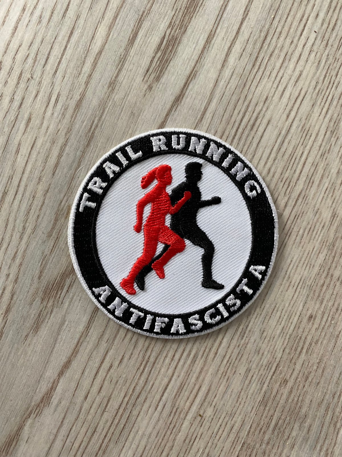 Image of Trail Running Antifa. Embroidered patch + sticker