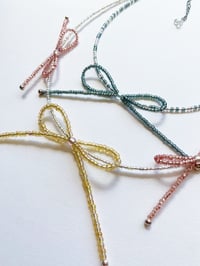Image 1 of Beaded Bow Necklaces