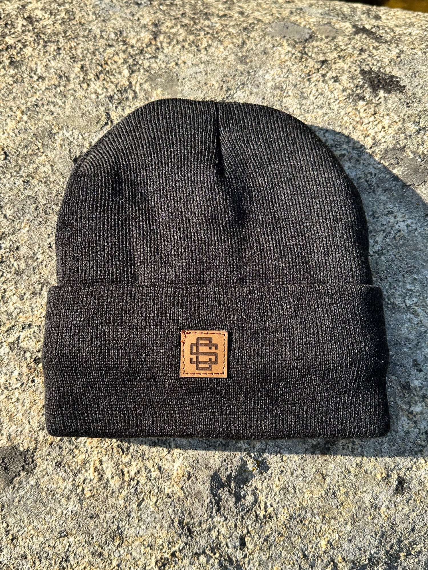 Black Sherpa-Lined Beanie with Brown Leather patch