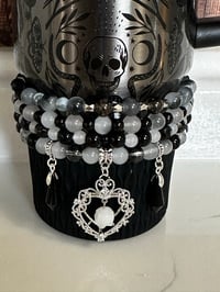 Image 1 of Black, White and Silver Skull Tumbler Bracelet Stack