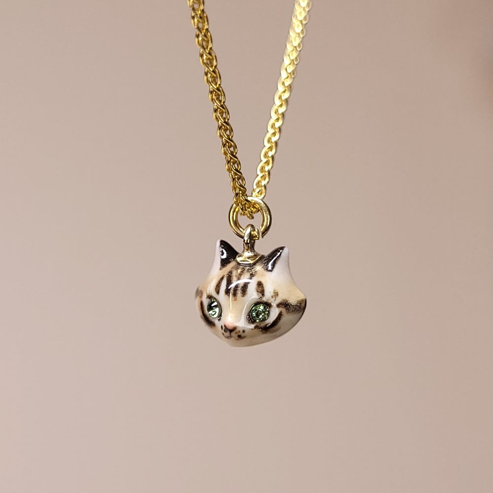 Image of Brown Tabby Porcelain & Gold Vermeil Teeny Tiny Cat Pendant Green Eyes