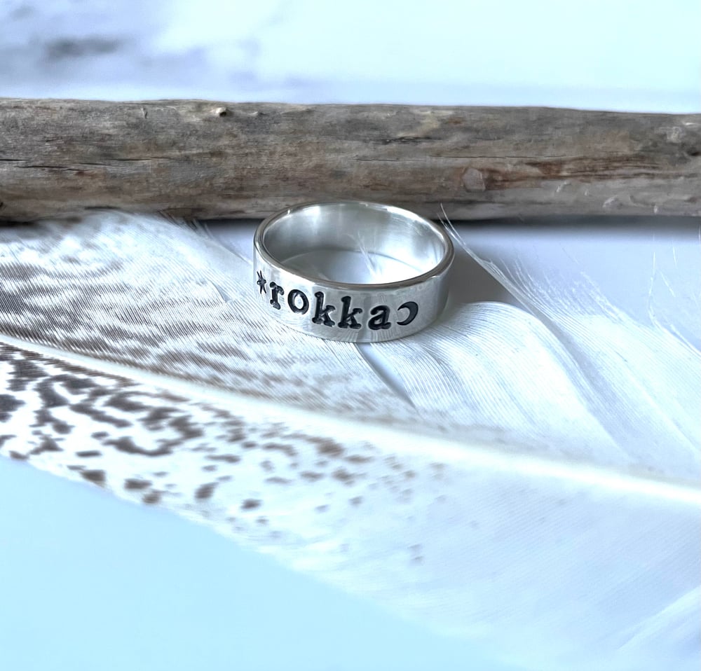 Personalised silver name ring with star and moon. Celestial silver 925 stamped word ring.