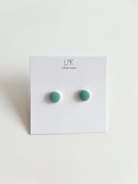 Paire de boucles d’oreilles céramique puces lagon