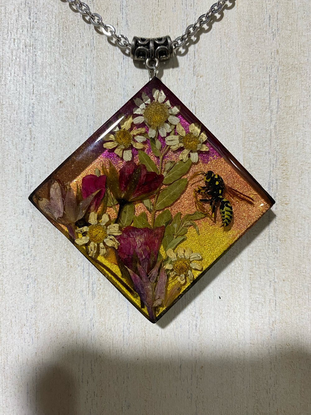 Wasp floral scene pendant 