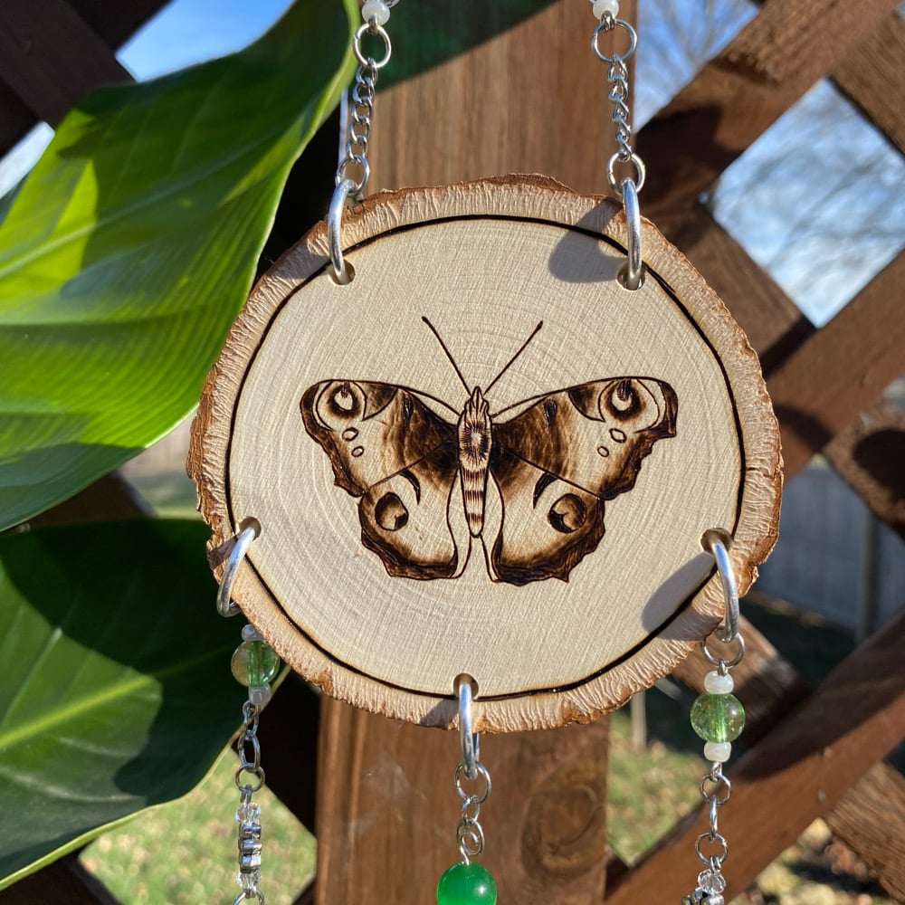 Image of malachite flight sun catcher 