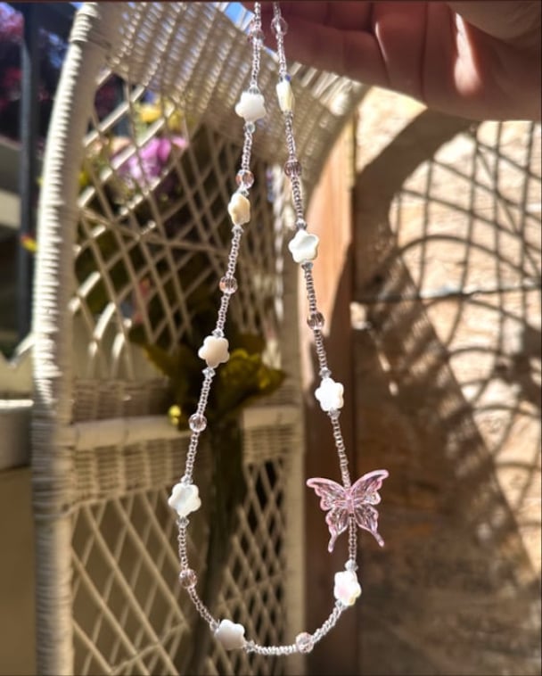 Image of floral butterfly necklace