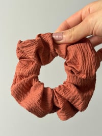 Image 1 of Rust coral scrunchie