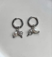 Image 1 of Stainless Steel Seashell Huggies