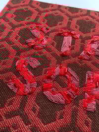 Image 4 of Original Secret Word Embroidery Artwork - “STAY SOFT” (Red Geometric Tapestry)