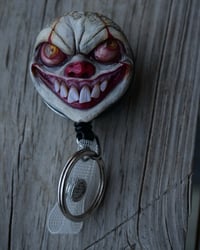 Image 3 of Handmade Pennywise Badge Reel Keychain OOAK