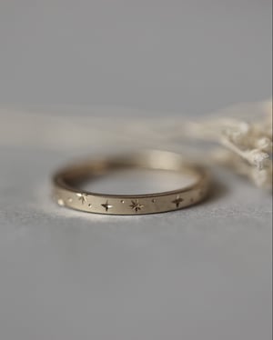 Image of 18ct Yellow gold 2mm ‘Star' Eternity ring