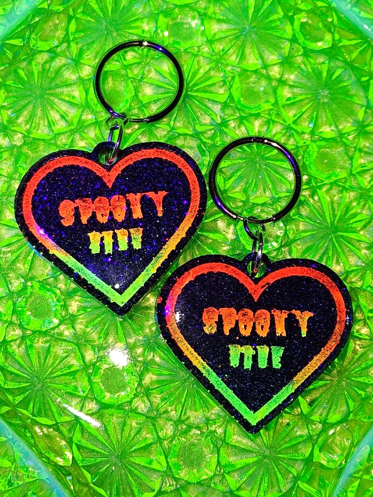 Image of Spooky Babe Heart Earrings: Black Holo w/ Neon Sunset Ombre Lettering