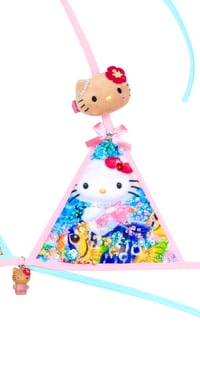 Image 2 of Diver swimming with tropical fish hellokitty