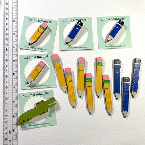 Image of handpainted wooden magnets -- pencils! oh, and an alligator